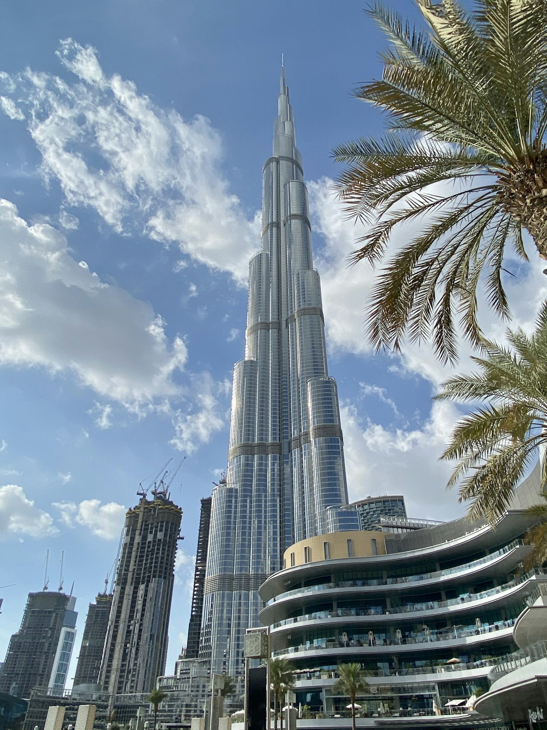 Looking up at a supertall tower in Downtown Dubai