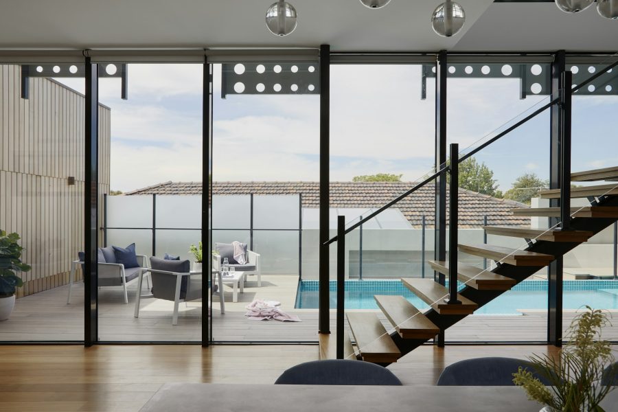 Floor-to-ceiling glazing and a floating staircase